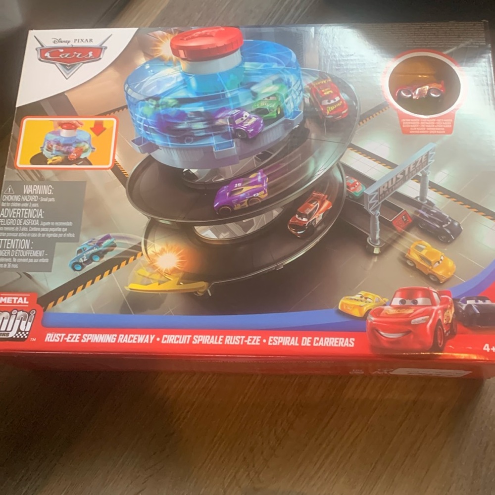 Unopened cars play set with race track